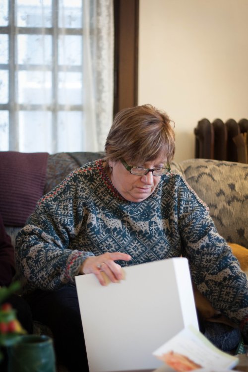 Julia's aunt Peg opening a present